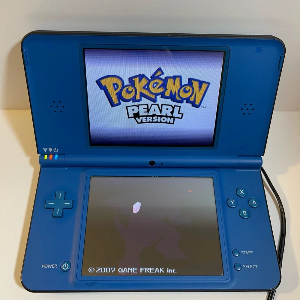 SOLD (1)Nintendo DSi XL Midnight Blue (1)NEW🔌 (1)NEW 32GB CARD (7)Games! - Picture 4 of 15